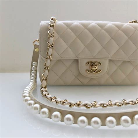 chanel white pearl bag|Chanel bag with pearls strap.